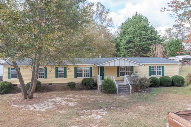 182 Poplar Springs Dr, Easley, SC 29642 - manufactured / mobile home featuring a porch, crawl space, and a shingled roof