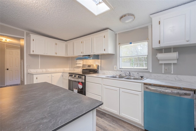 kitchen featuring light wood-type flooring, white cabinetry, and stainless steel appliances