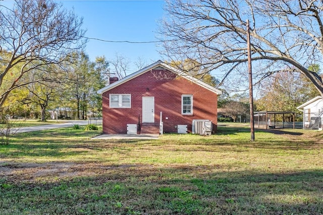 view of property exterior featuring a yard and cooling unit