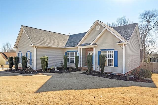 view of front of property with a front lawn