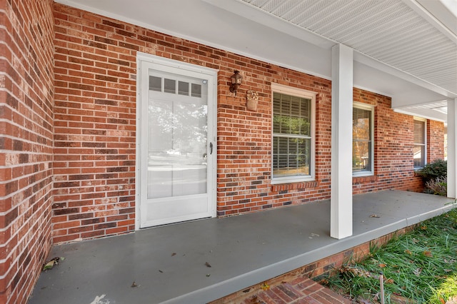 entrance to property with a porch