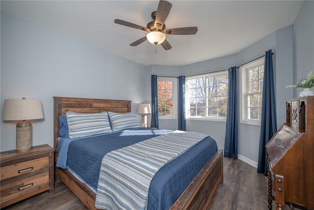 bedroom featuring ceiling fan and dark hardwood / wood-style flooring