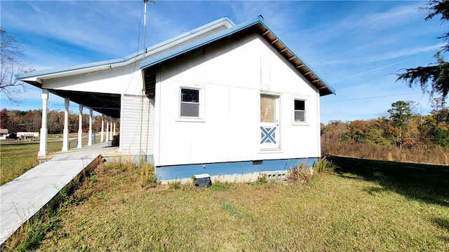 view of home's exterior featuring a lawn