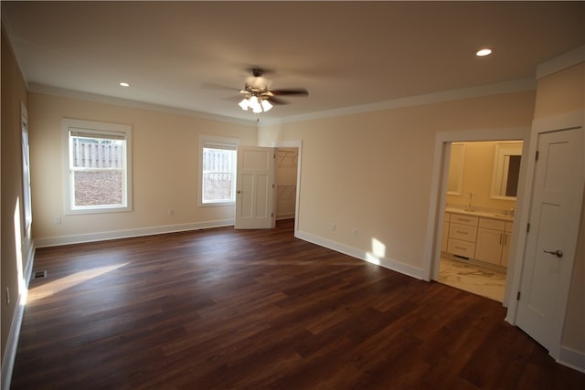 interior space featuring ceiling fan, dark hardwood / wood-style flooring, and ornamental molding