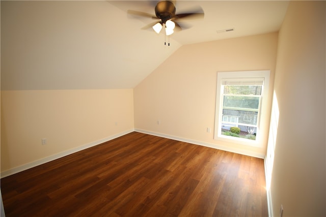 additional living space with hardwood / wood-style flooring, ceiling fan, and lofted ceiling