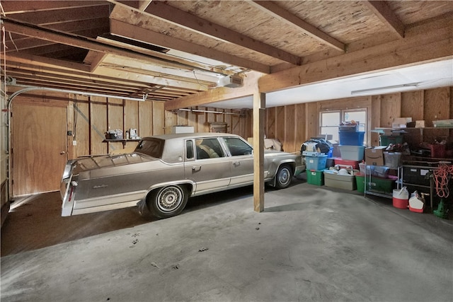 garage featuring a carport and a garage door opener