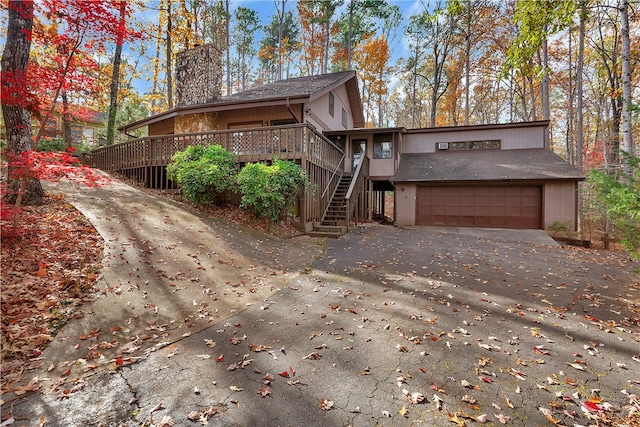 view of front of property with a wooden deck