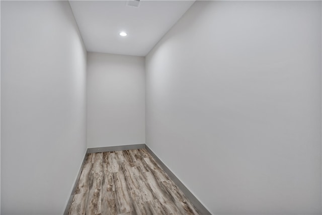 empty room with light hardwood / wood-style floors