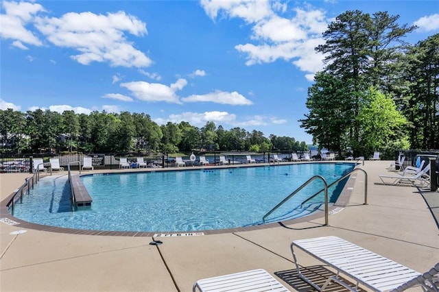 view of swimming pool featuring a patio