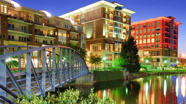 view of building exterior with a water view