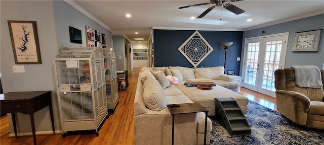 living room featuring ceiling fan, french doors, wood finished floors, and ornamental molding