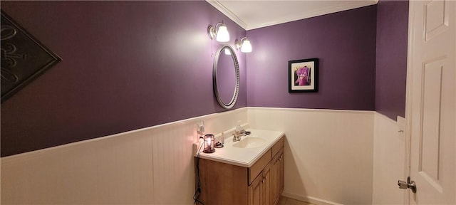 bathroom with vanity and crown molding