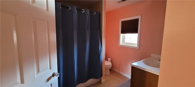 bathroom featuring tile patterned floors, vanity, curtained shower, toilet, and visible vents