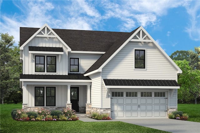 view of front of home featuring a garage and a front lawn