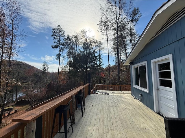 wooden deck featuring a mountain view