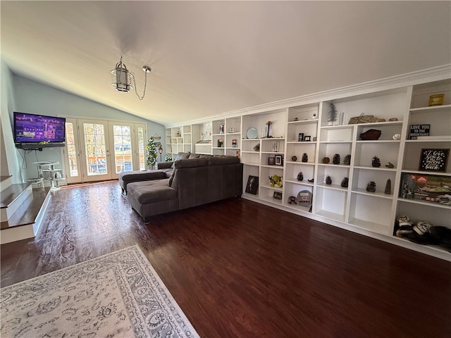 living room with french doors, vaulted ceiling, and dark wood-type flooring