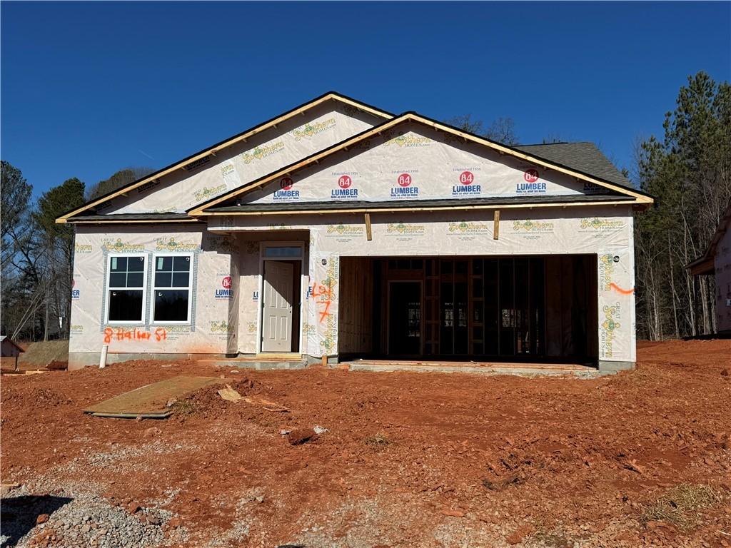 property under construction with a garage