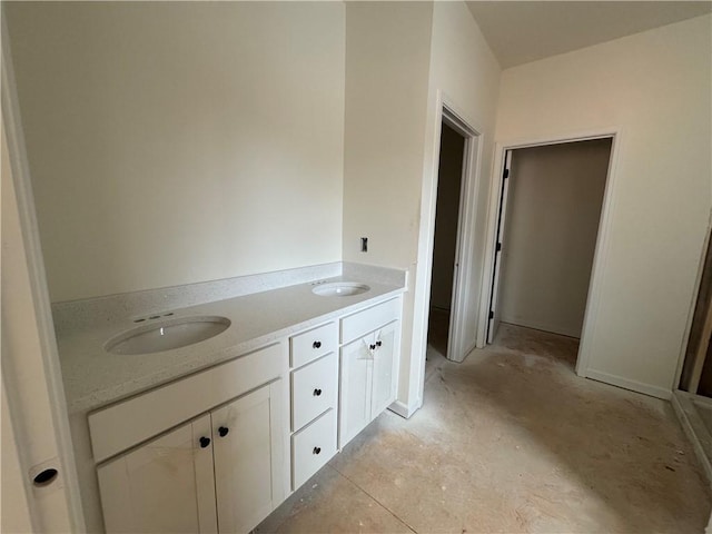 bathroom with double vanity and a sink