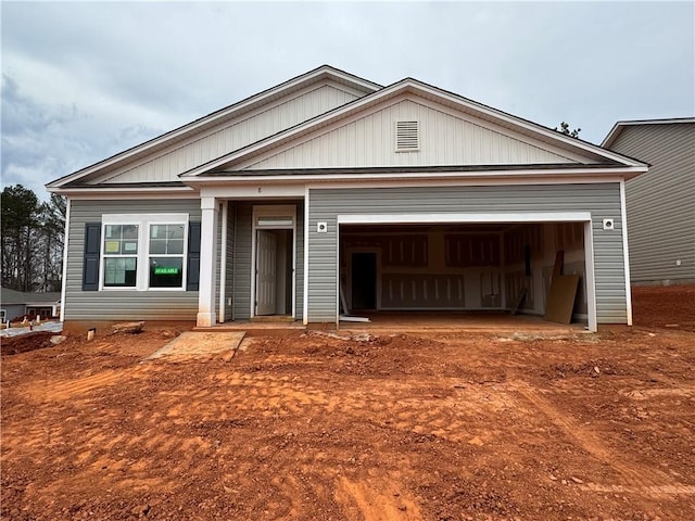 view of front of property featuring a garage