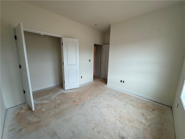 unfurnished bedroom featuring baseboards