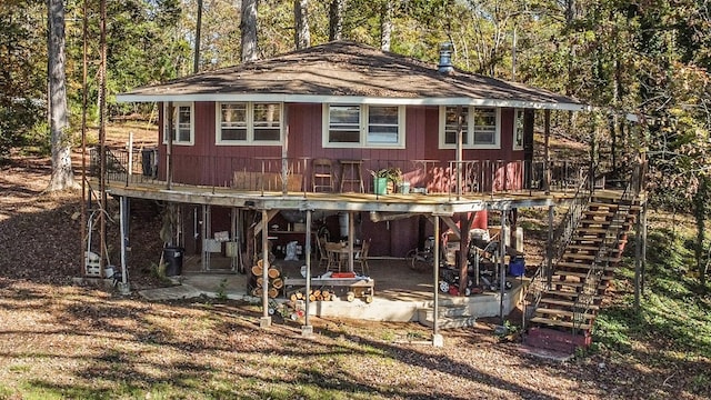 exterior space featuring a patio area and a deck