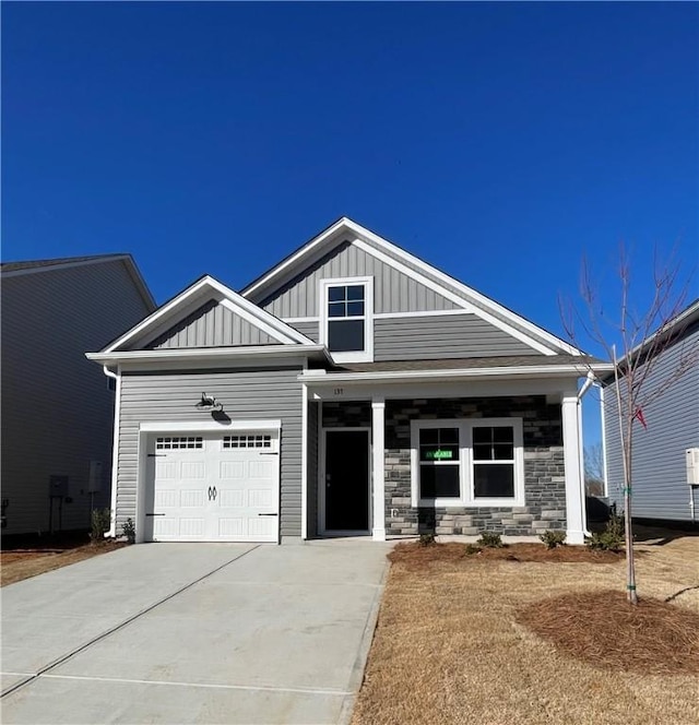 craftsman-style home with a garage