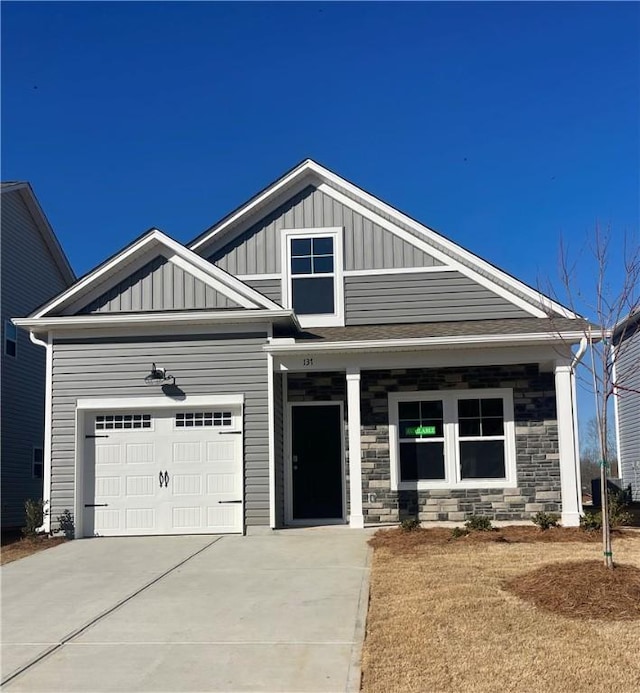 craftsman inspired home featuring a garage