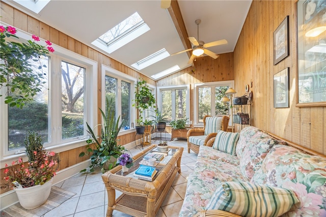 sunroom / solarium with ceiling fan and lofted ceiling