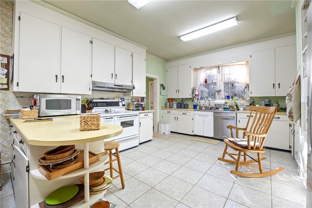 kitchen with tasteful backsplash, stainless steel dishwasher, ornamental molding, white electric range oven, and white cabinetry