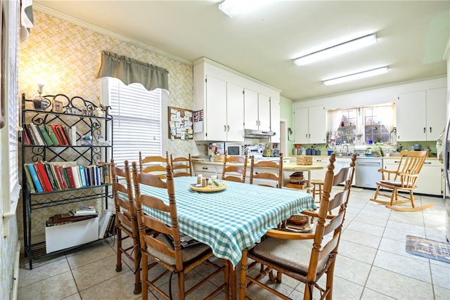 tiled dining room with ornamental molding