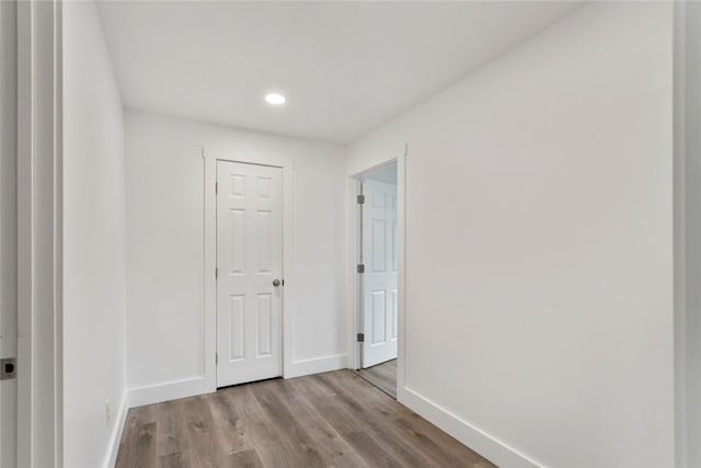 corridor featuring light hardwood / wood-style flooring