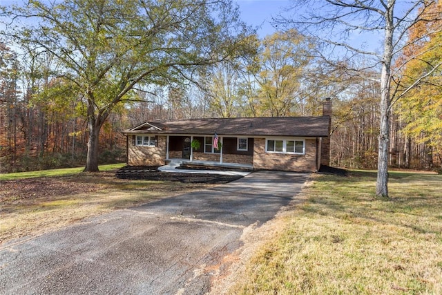 ranch-style home featuring a porch