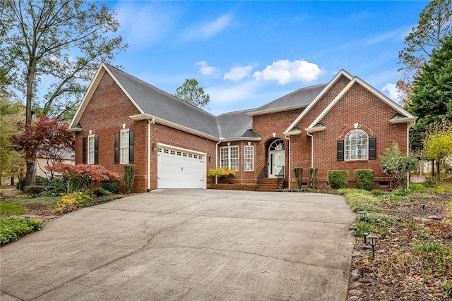 front of property with a garage