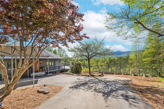 exterior space with a mountain view and covered porch