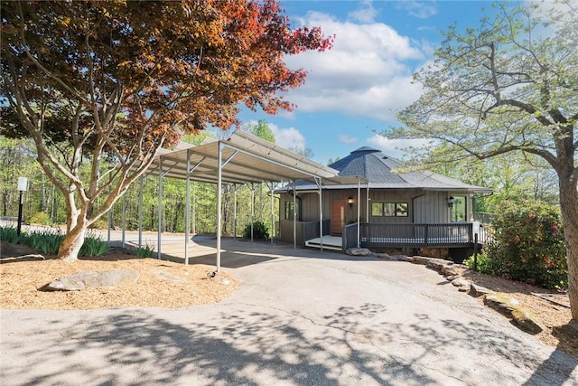 view of front of property with a carport