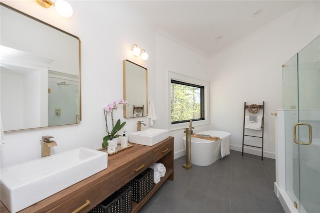 bathroom featuring crown molding, vanity, and shower with separate bathtub