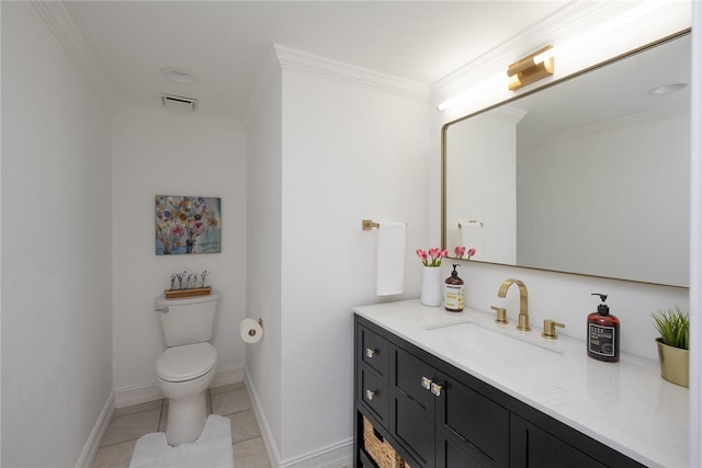 bathroom featuring toilet, vanity, tile patterned floors, and ornamental molding