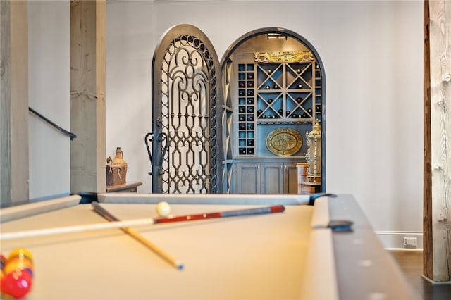 interior space with hardwood / wood-style floors and pool table