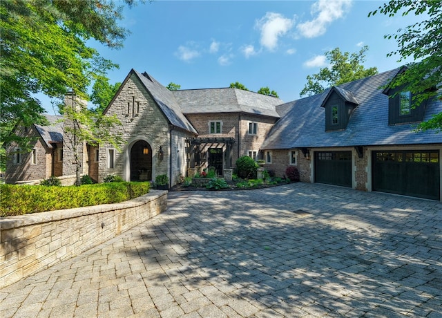 133 Leaping Brook Way, Six Mile, SC 29682 - tudor home with decorative driveway, stone siding, and a high end roof