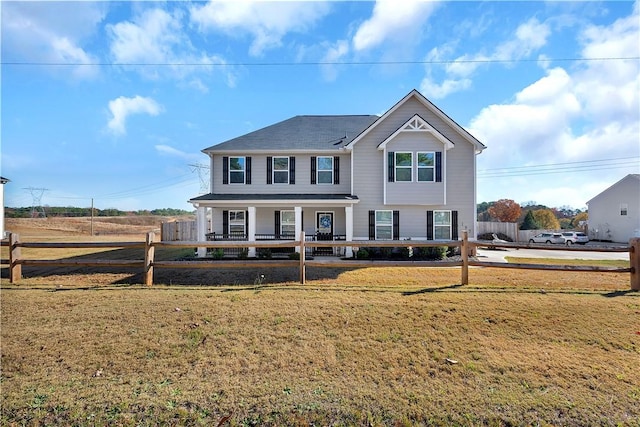 view of front of home with a front lawn and covered porch