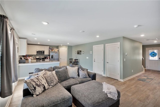 living room featuring light hardwood / wood-style floors