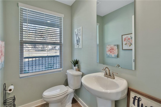 bathroom with toilet and sink