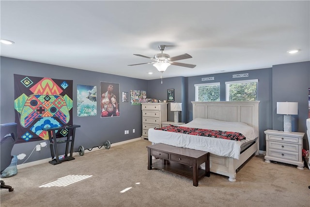 bedroom featuring light carpet and ceiling fan