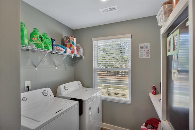 laundry area featuring washer and clothes dryer