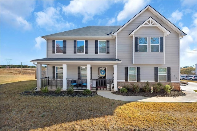 view of front of home featuring a front lawn