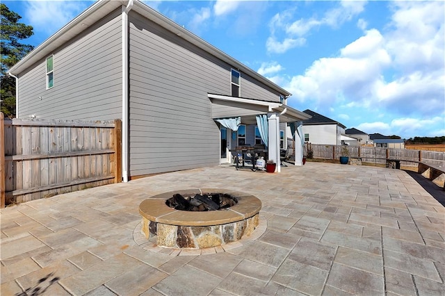 view of patio featuring a fire pit