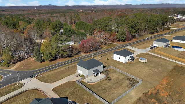 drone / aerial view featuring a mountain view