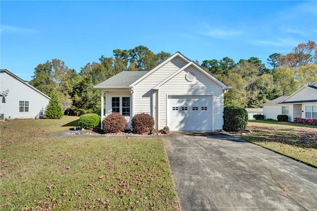 exterior space featuring a garage and a front lawn