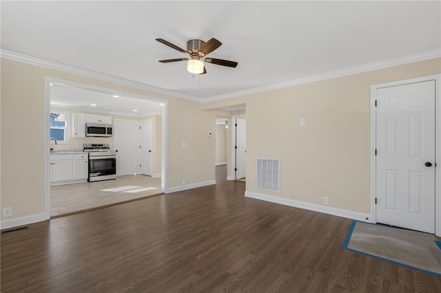 unfurnished living room featuring dark hardwood / wood-style flooring, ceiling fan, ornamental molding, and sink