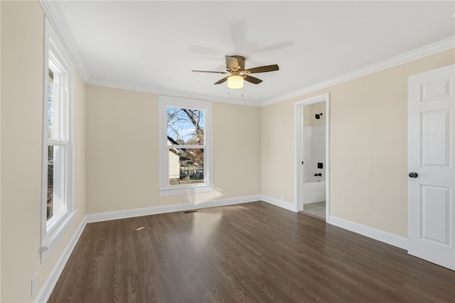 empty room with crown molding, ceiling fan, and dark wood-type flooring